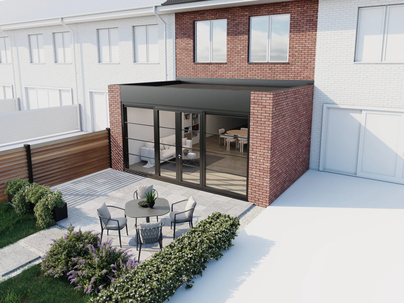 Sfeerimpressie van de aanbouw met terras en tuin